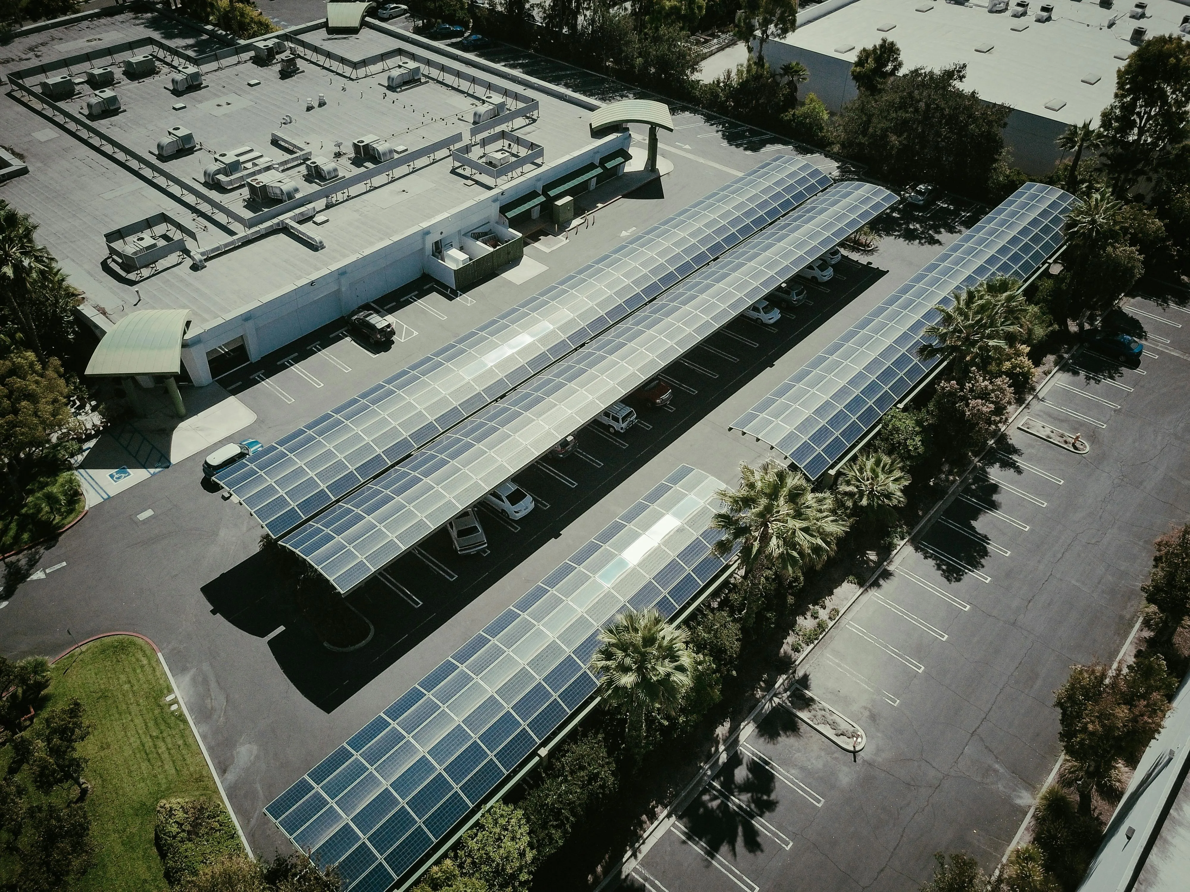 Aerial view of a large commercial rooftop solar array